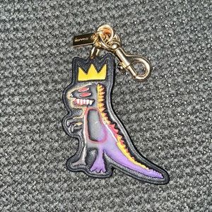 COACH DINO CHARM From the COACHx Jean-Michel Basquiat Limited Edition collection